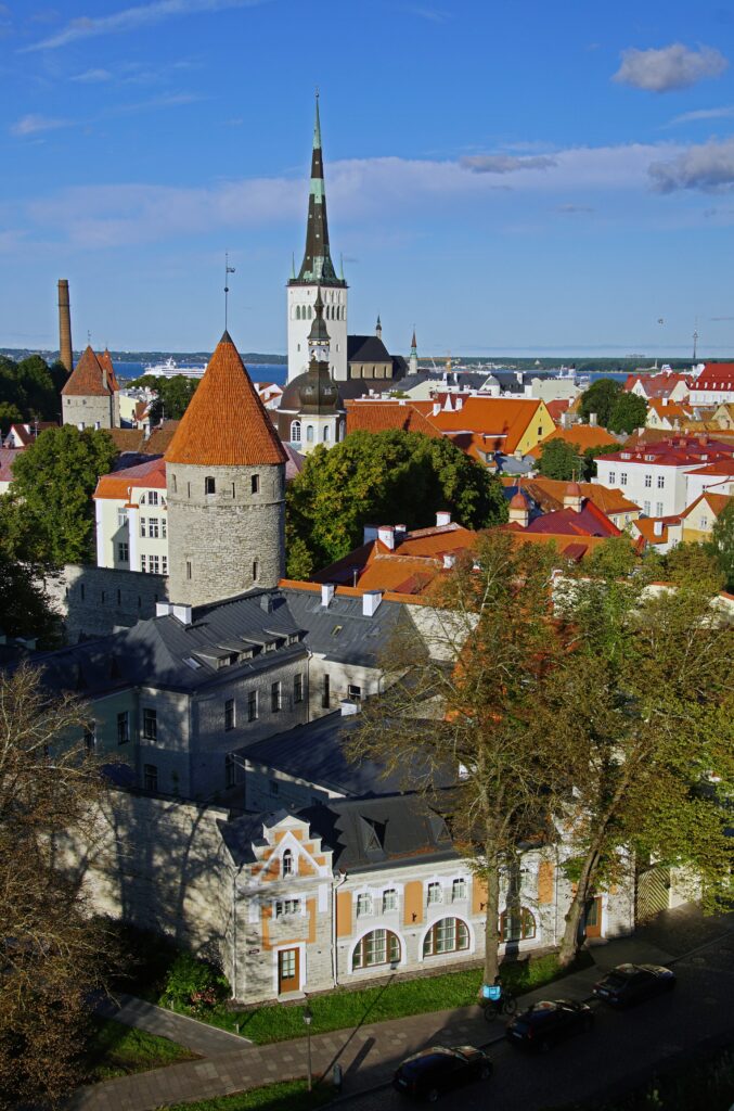 An aerial view of a city with tall buildings An aerial view of a city with tall buildings