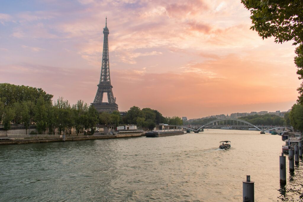 The eiffel tower towering over the city of paris The eiffel tower towering over the city of paris