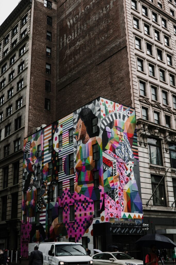 a building with a mural on it a building with a mural on it