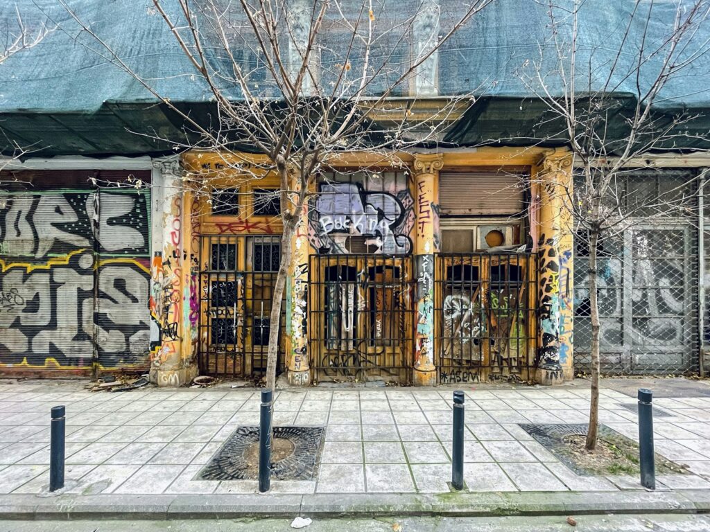 a building with graffiti on the side of it a building with graffiti on the side of it