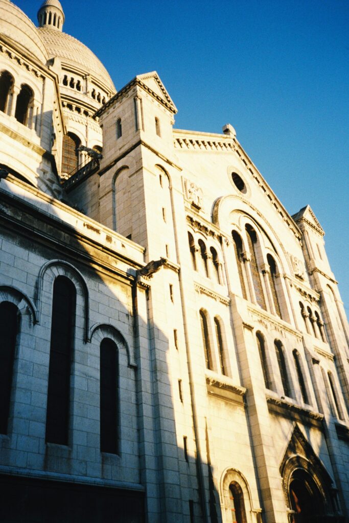 a large building with a clock on the front of it a large building with a clock on the front of it