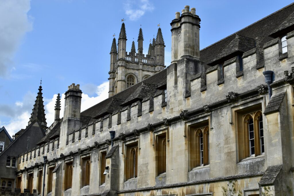 a large building with many windows and a clock tower a large building with many windows and a clock tower