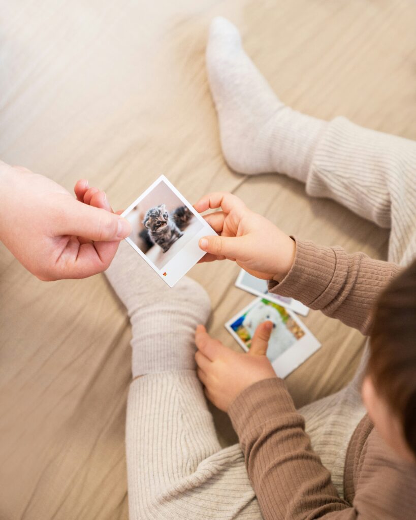 a person is holding a picture of a dog a person is holding a picture of a dog